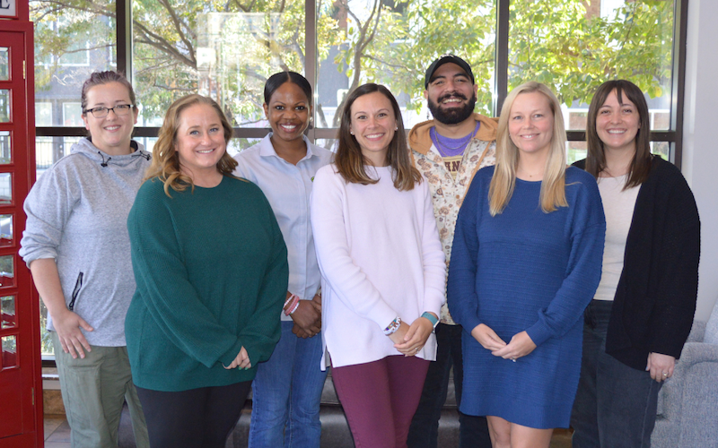 Quaver Ed training team members standing together for a group photo.